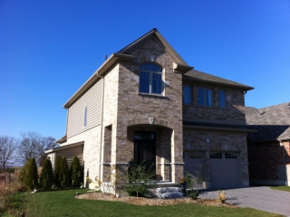 Insulated Backed Prodigy Siding, New Doors and Windows