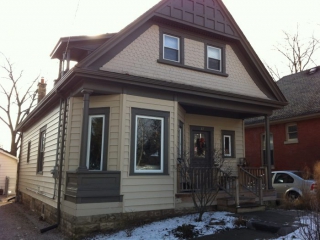 New 7″ Insulated Backed Prodigy Siding and new Trough and Fascia