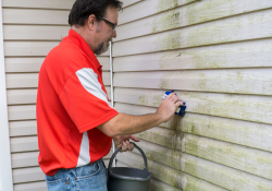 McCallum Aluminum Man Cleaning Mold And Mildew Off Of Vinyl Siding On House Vinyl Siding Maintenance Blog