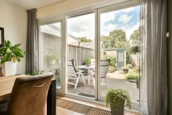 inviting patio with table and chairs 2026 03 18 13 42 10 utc